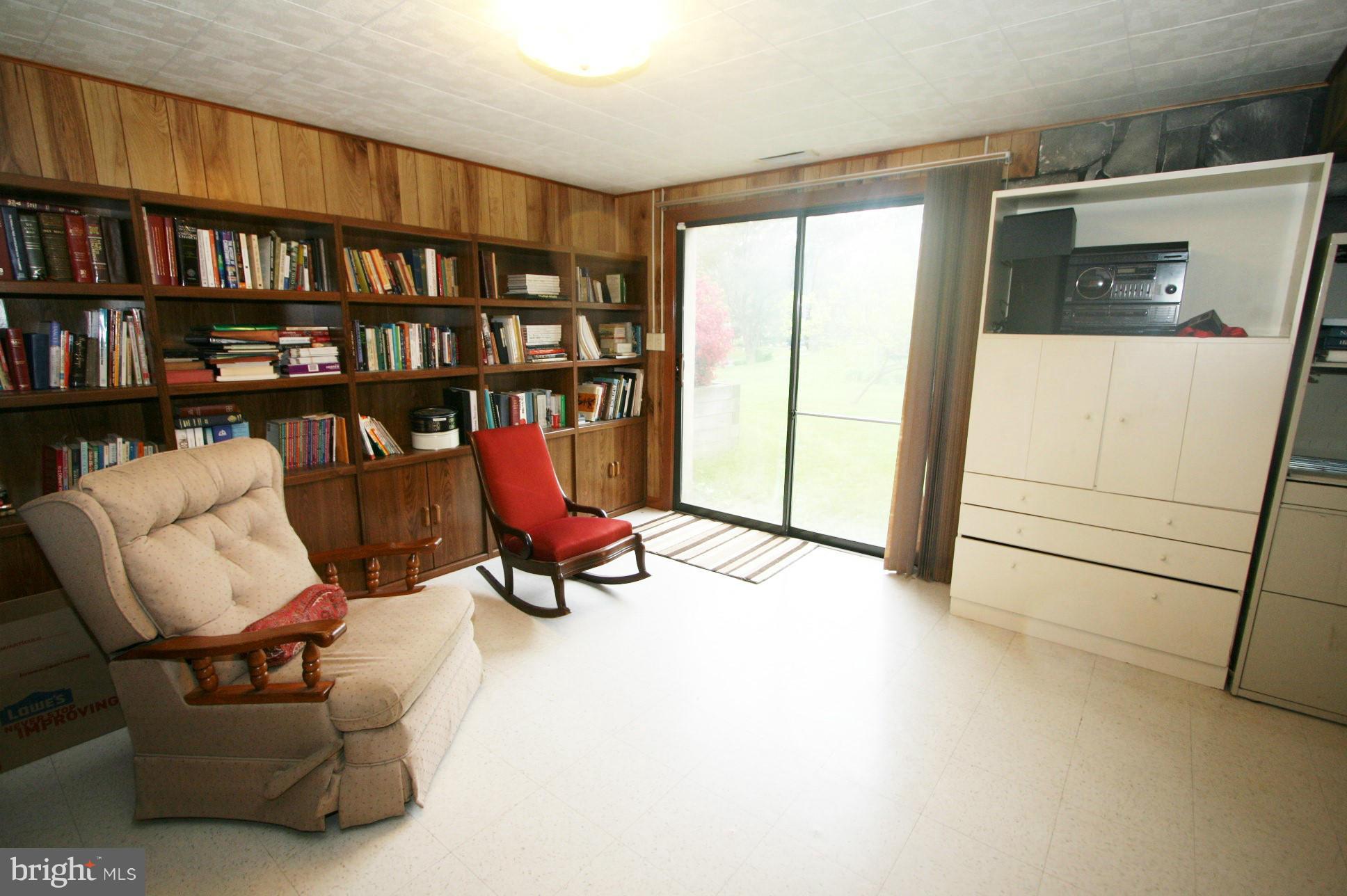 9406 North Penfield Road Columbia, MD 21045 - Photo 26 of 30 Basement with slider to side yard