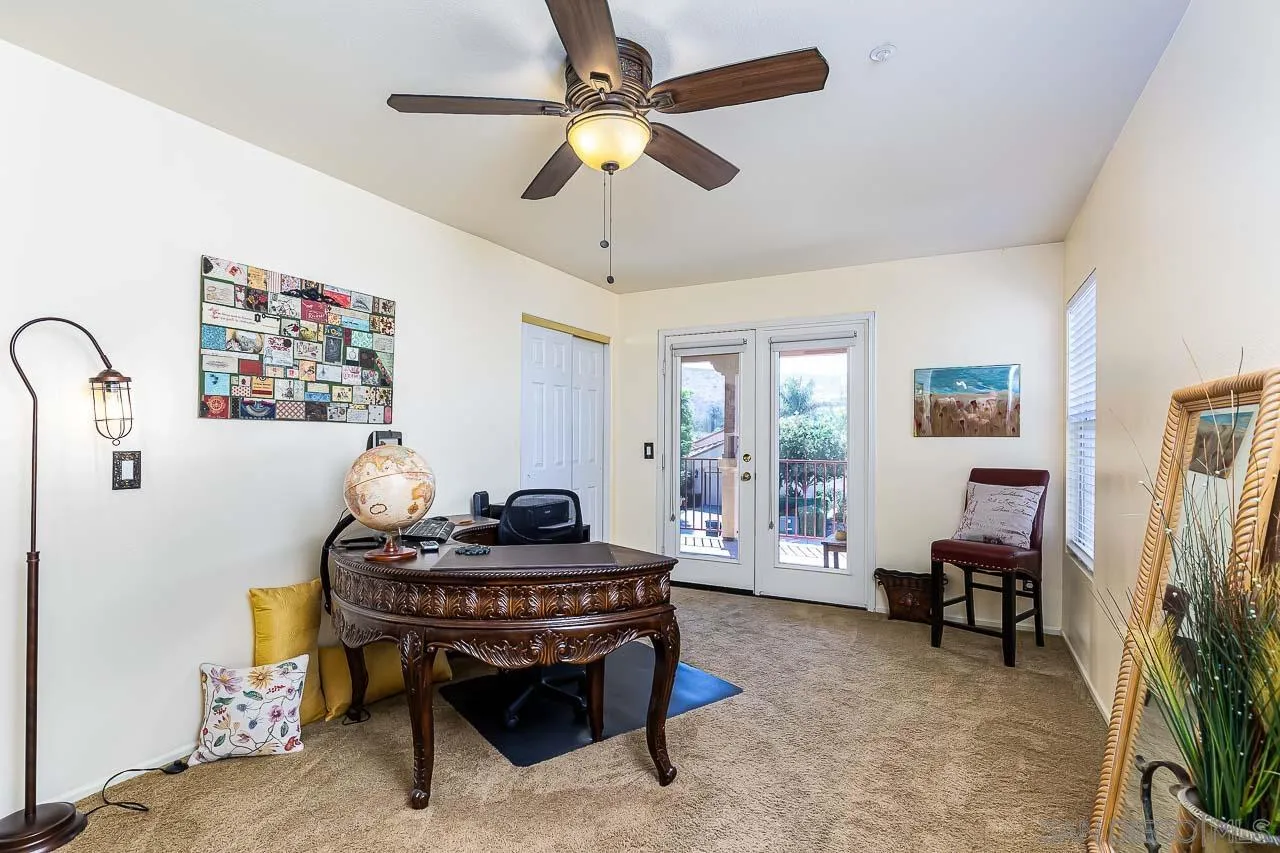2477 Fallbrook Place Escondido, CA 92027 - Photo 13 of 28 a living room with furniture and a window
