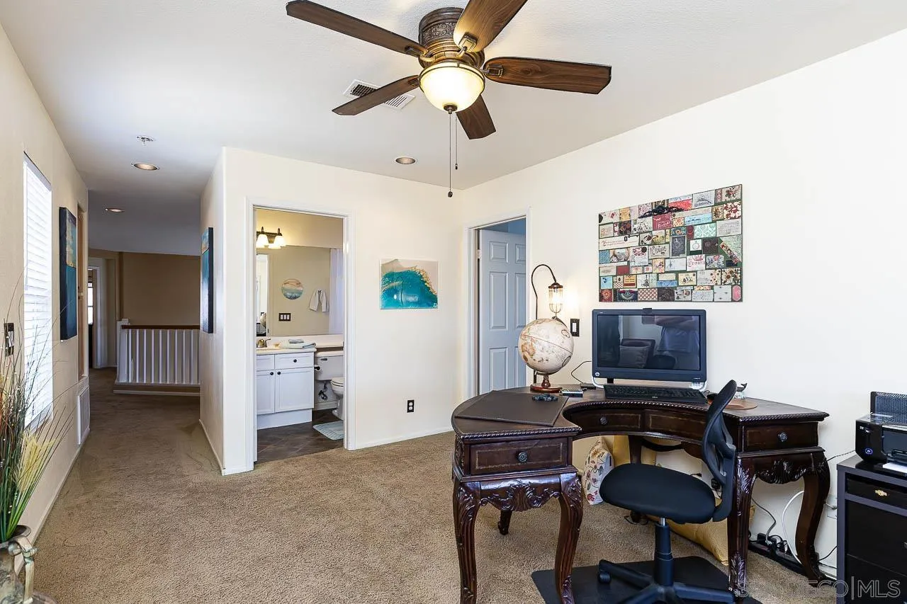 2477 Fallbrook Place Escondido, CA 92027 - Photo 14 of 28 a view of a workspace with furniture
