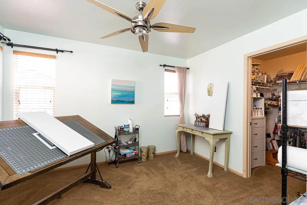 2477 Fallbrook Place Escondido, CA 92027 - Photo 16 of 28 a view of a workspace with furniture and a window
