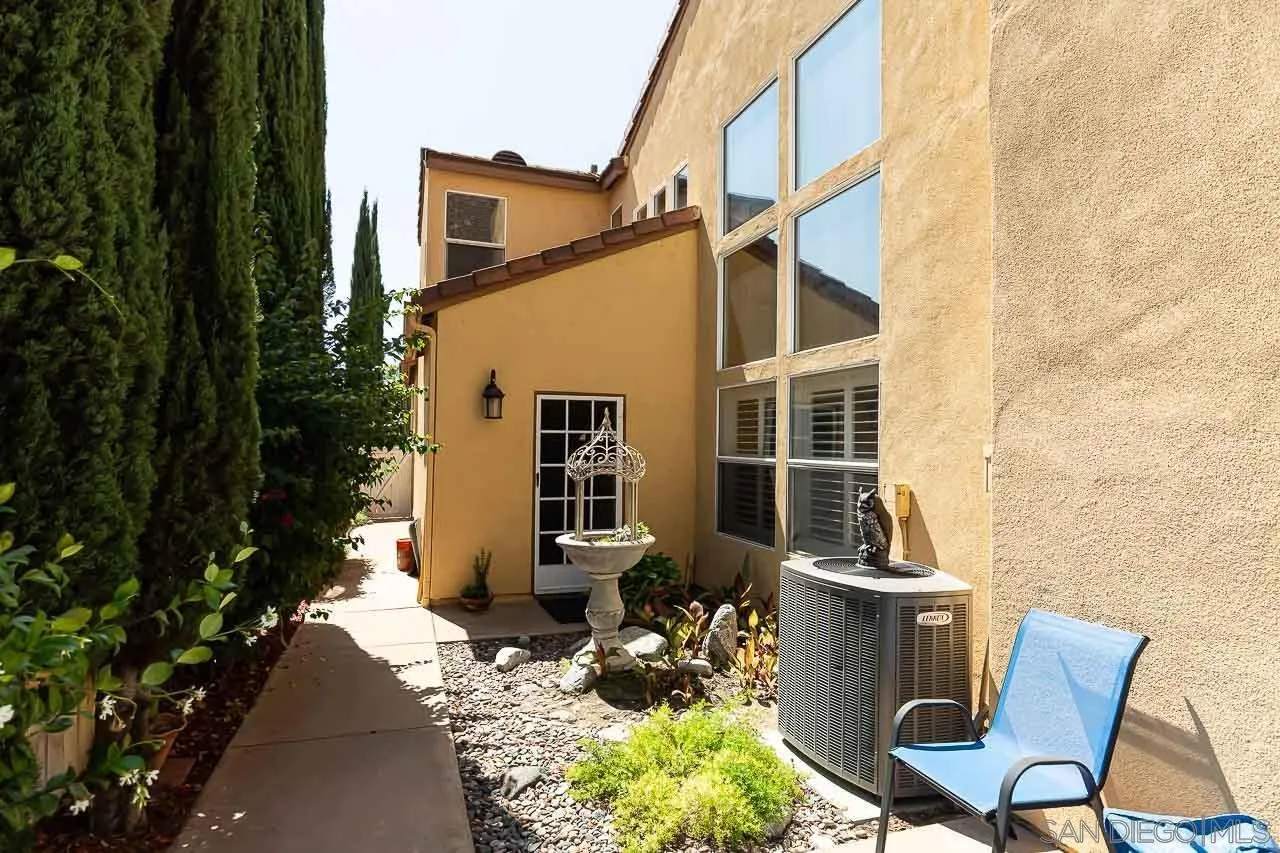 2477 Fallbrook Place Escondido, CA 92027 - Photo 25 of 28 a backyard of a house with yard fire pit and outdoor seating