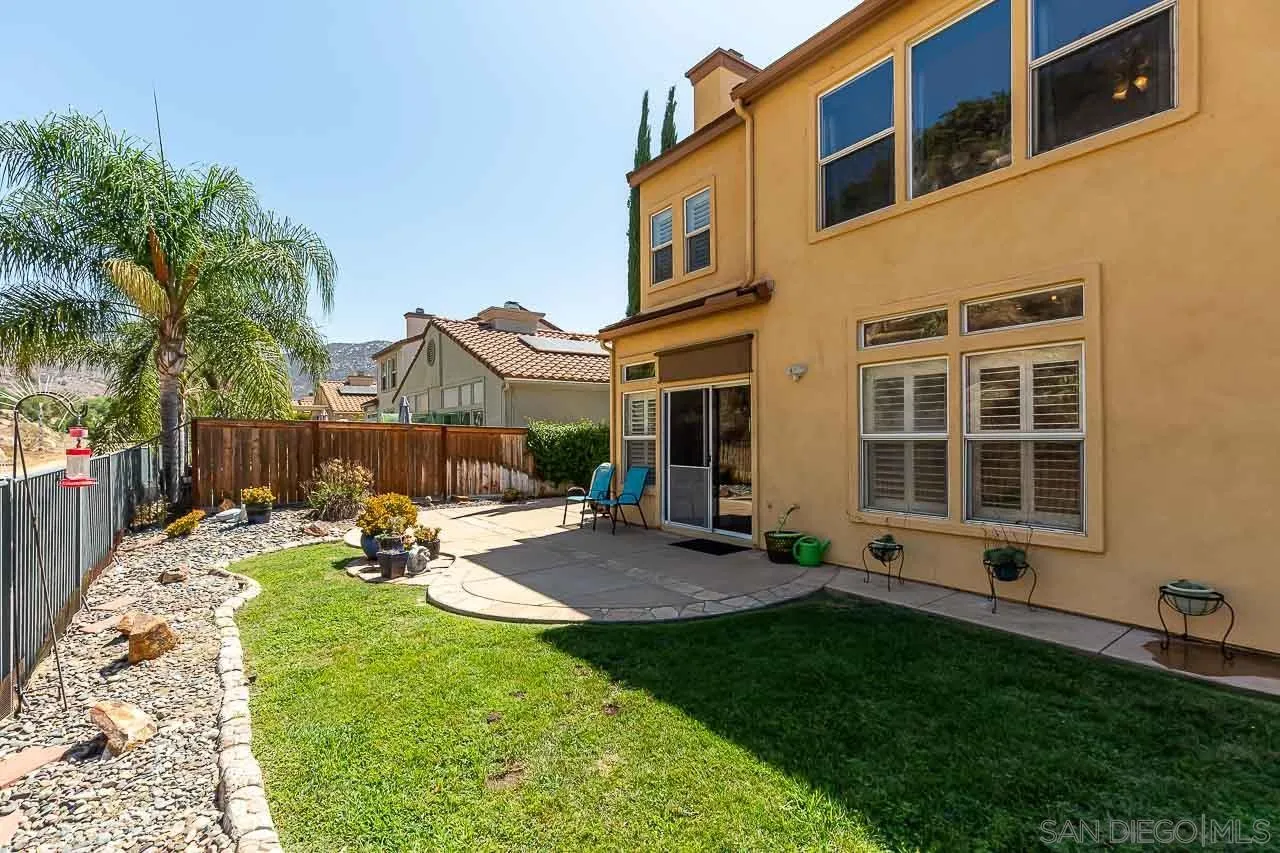 2477 Fallbrook Place Escondido, CA 92027 - Photo 28 of 28 a view of a backyard with a sitting area