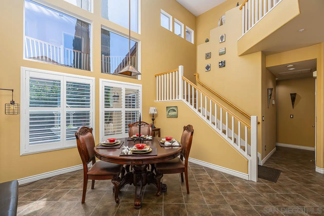 2477 Fallbrook Place Escondido, CA 92027 - Photo 4 of 28 a view of a dining room with furniture and a window