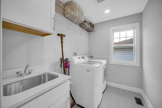 a view of utility room and sink