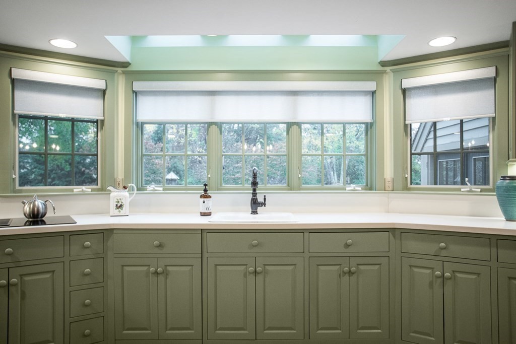 34 Barretts Mill Road Concord, MA 01742 - Photo 11 of 40 a sink with a window and mirror