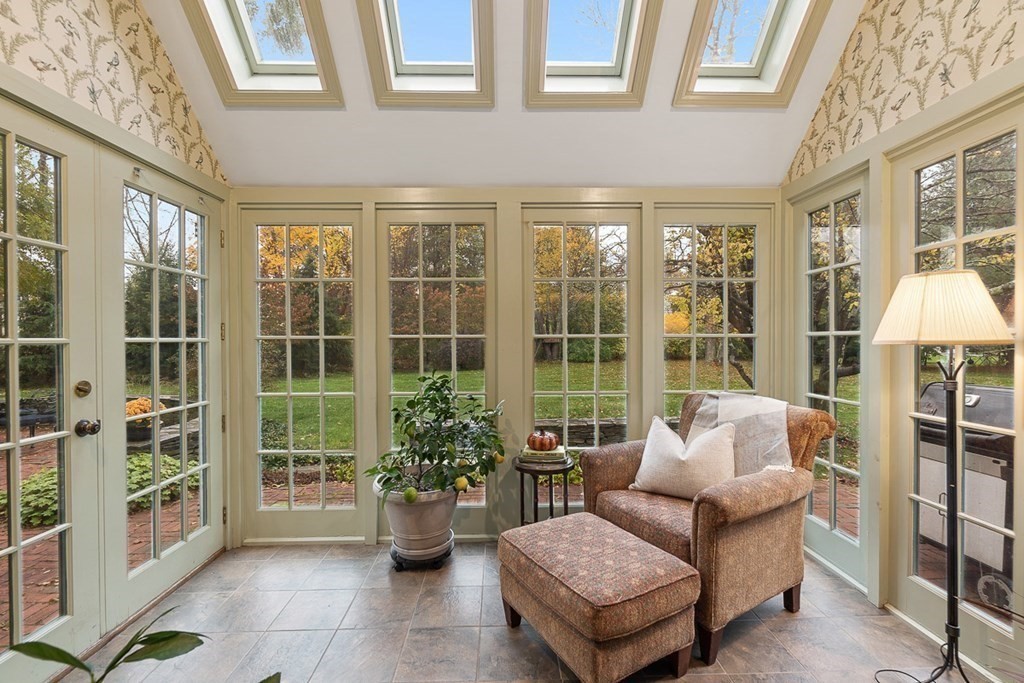 34 Barretts Mill Road Concord, MA 01742 - Photo 14 of 40 a balcony with furniture and potted plants