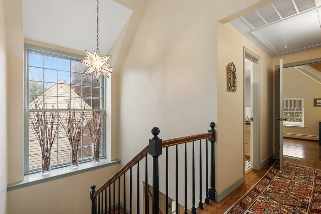 34 Barretts Mill Road Concord, MA 01742 - Photo 16 of 40 a view of an entryway with a chandelier