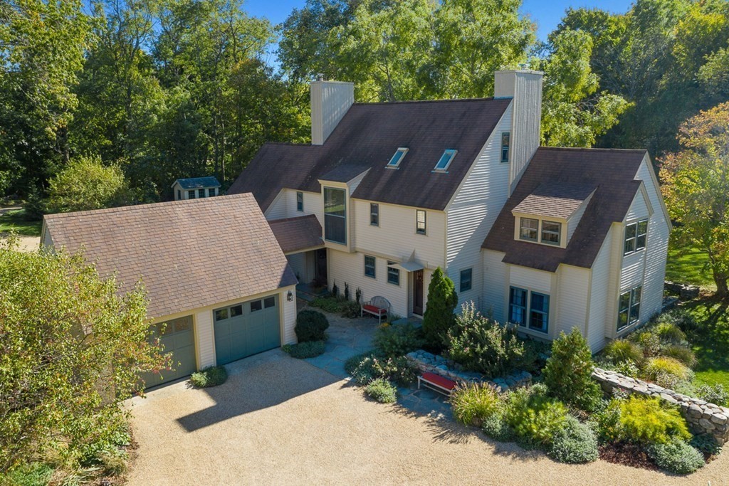 34 Barretts Mill Road Concord, MA 01742 - Photo 2 of 40 an aerial view of a house with yard and green space