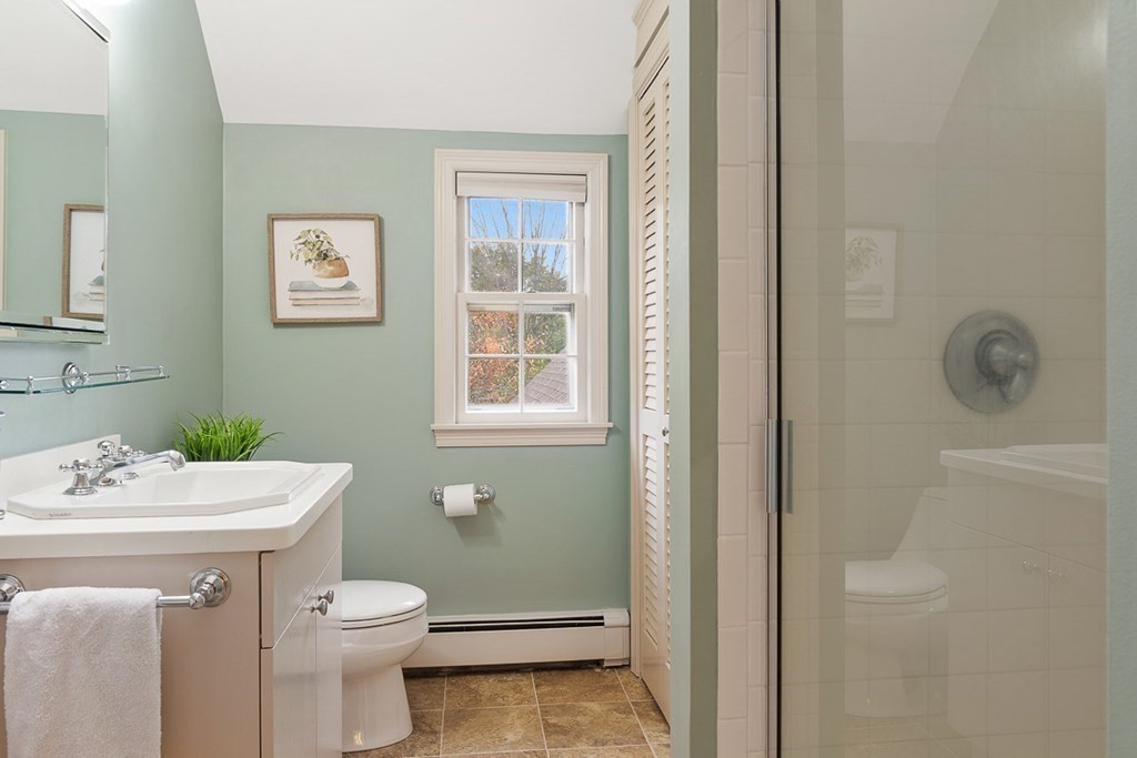 34 Barretts Mill Road Concord, MA 01742 - Photo 25 of 40 a bathroom with a sink a toilet and shower