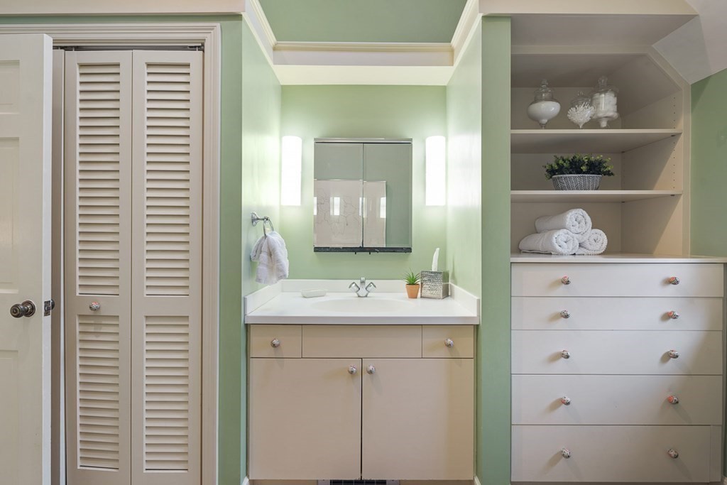 34 Barretts Mill Road Concord, MA 01742 - Photo 26 of 40 a bathroom with a sink and a mirror