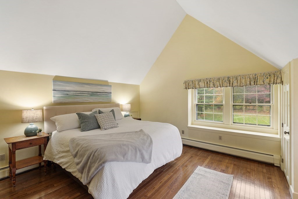 34 Barretts Mill Road Concord, MA 01742 - Photo 28 of 40 a bedroom with a bed and a window