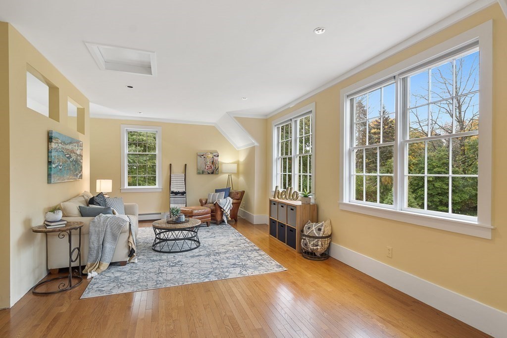 34 Barretts Mill Road Concord, MA 01742 - Photo 30 of 40 a living room with furniture and a large window