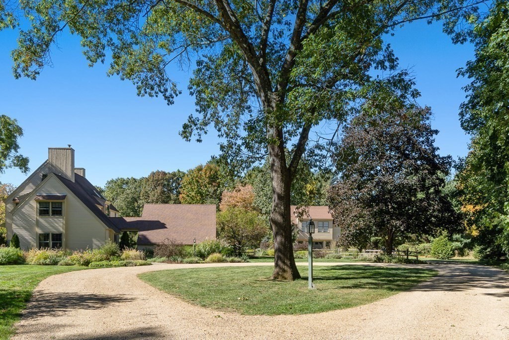 34 Barretts Mill Road Concord, MA 01742 - Photo 35 of 40 a tree in the middle of a yard