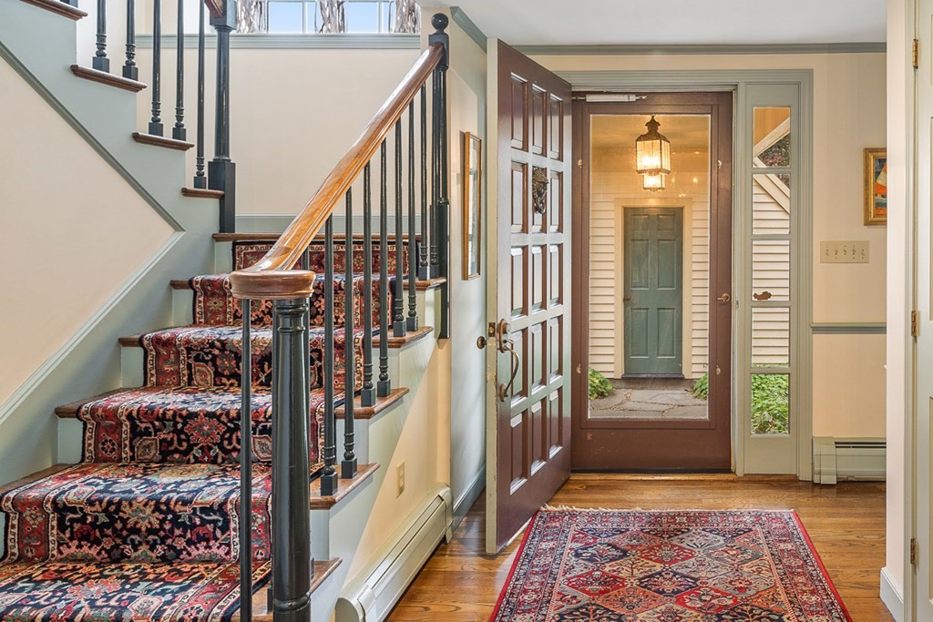 34 Barretts Mill Road Concord, MA 01742 - Photo 4 of 40 a view of entryway with stairs and furniture