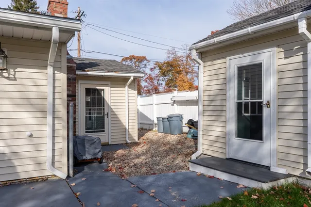 a view of a house with a door and a window