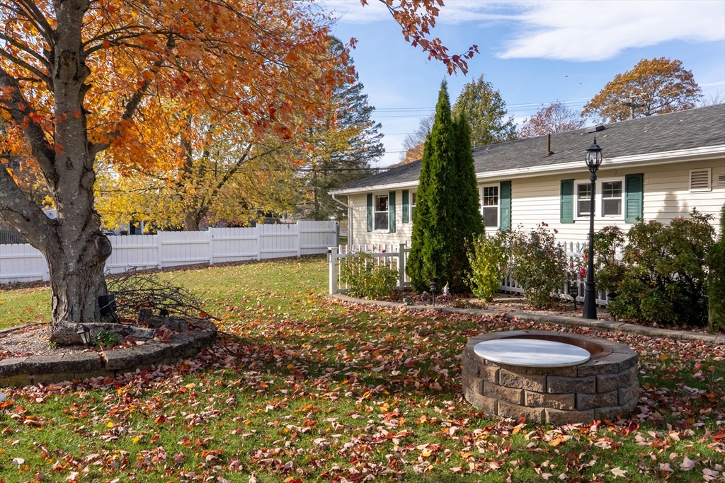 81 Dixon Road Brockton, MA 02302 - Photo 20 of 42 a front view of a house with garden
