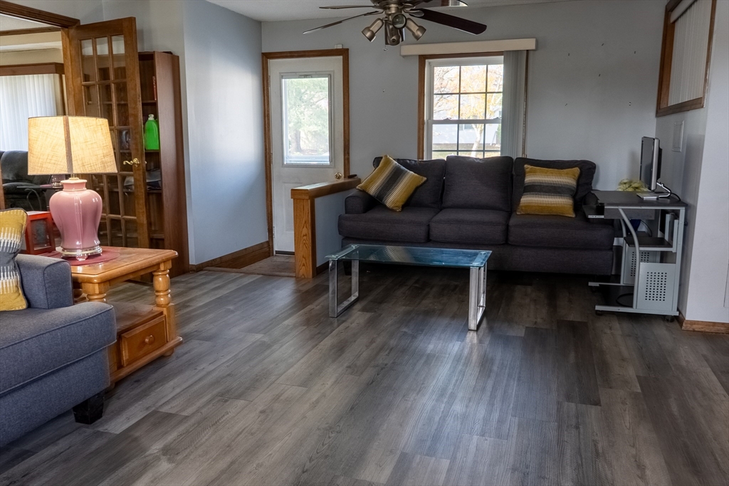 81 Dixon Road Brockton, MA 02302 - Photo 21 of 42 a living room with furniture and wooden floor