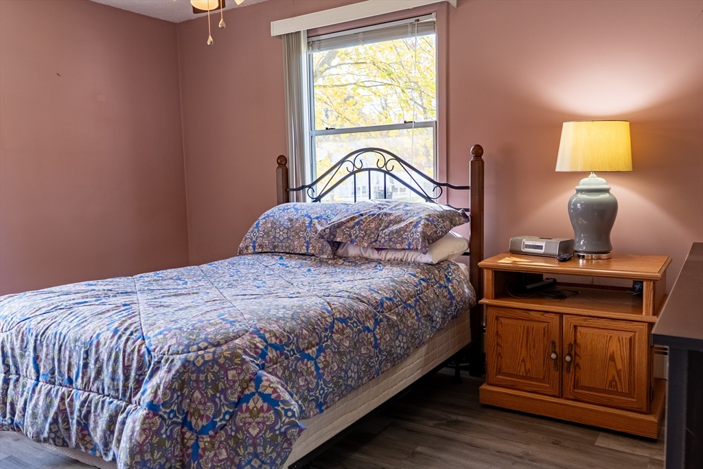 81 Dixon Road Brockton, MA 02302 - Photo 8 of 42 a bedroom with a bed and a window