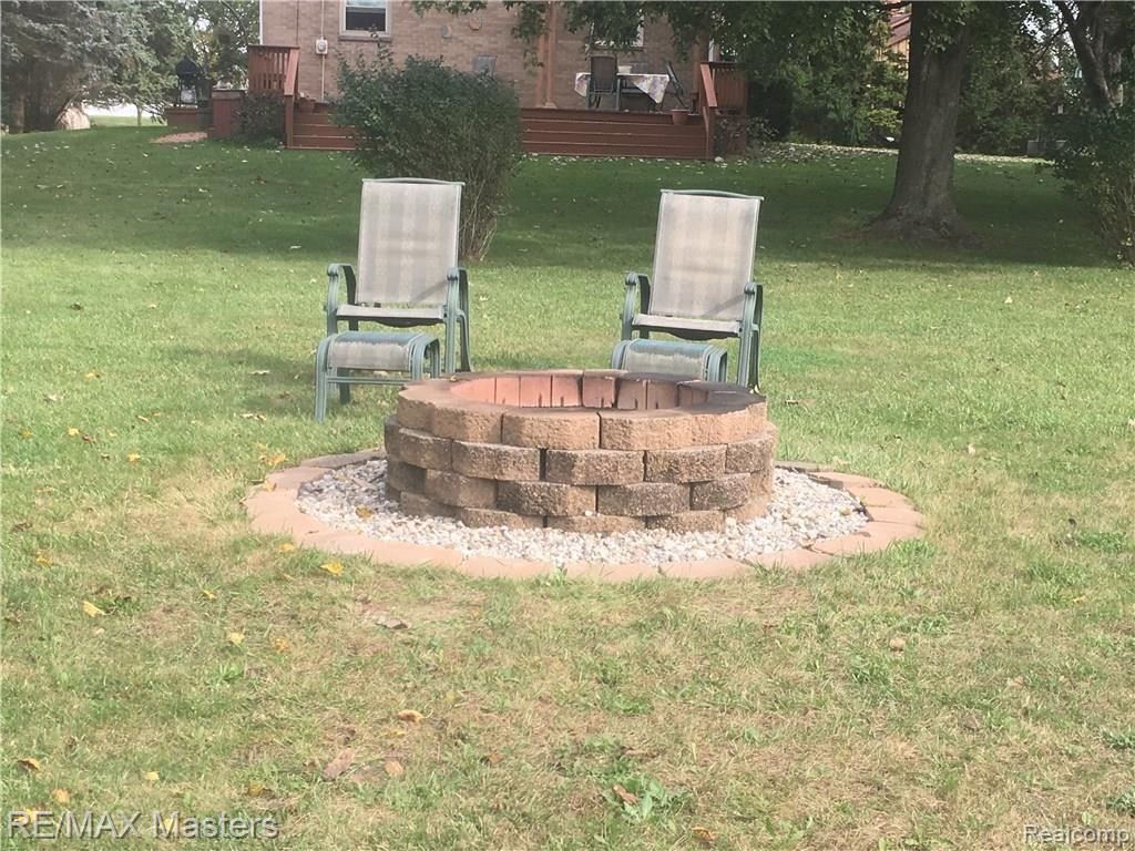 9805 Ferder Road Maybee, MI 48159 - Photo 17 of 20 Entertain Around Your Fire Pit