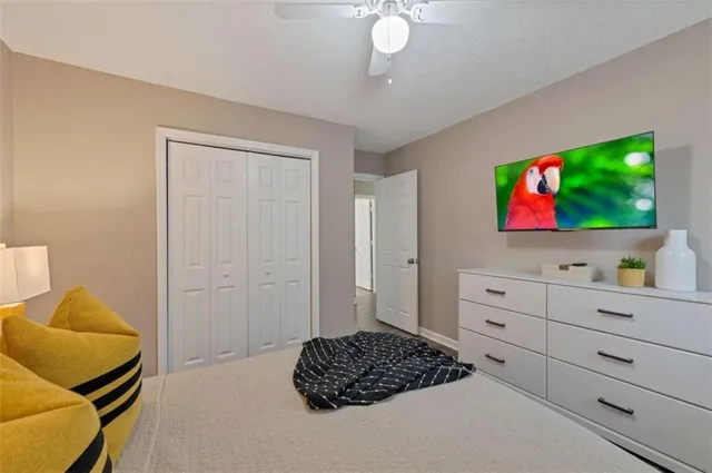 a room with furniture and a flat screen tv