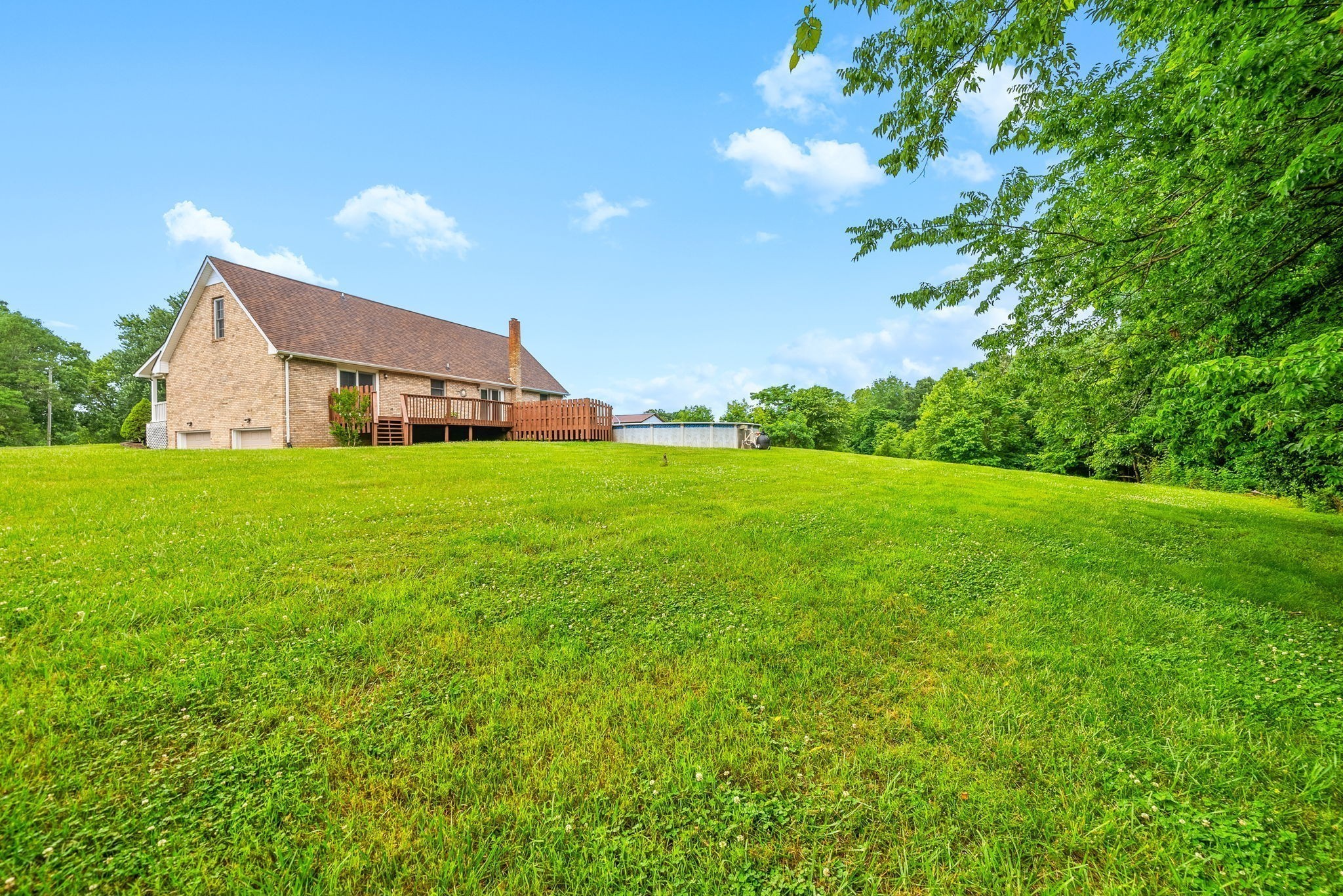 2430 Underwood Road Cunningham, TN 37052 - Photo 38 of 49 a view of a house with a yard