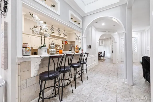 a outdoor dining space with furniture and view kitchen