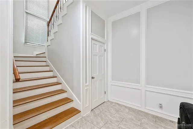 a view of entryway with stairs