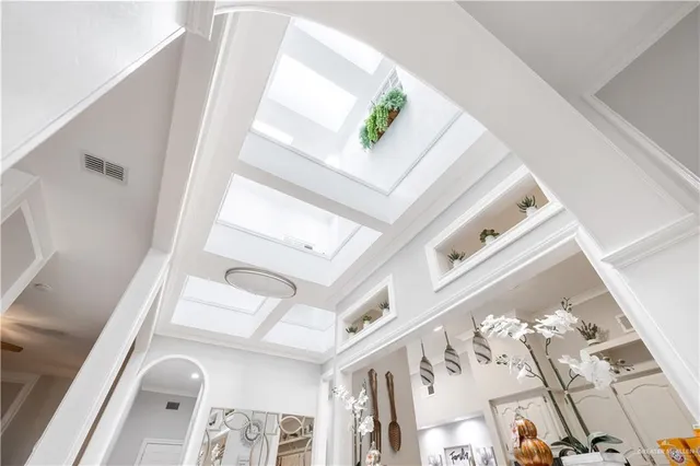 a view of living room with furniture and a large window