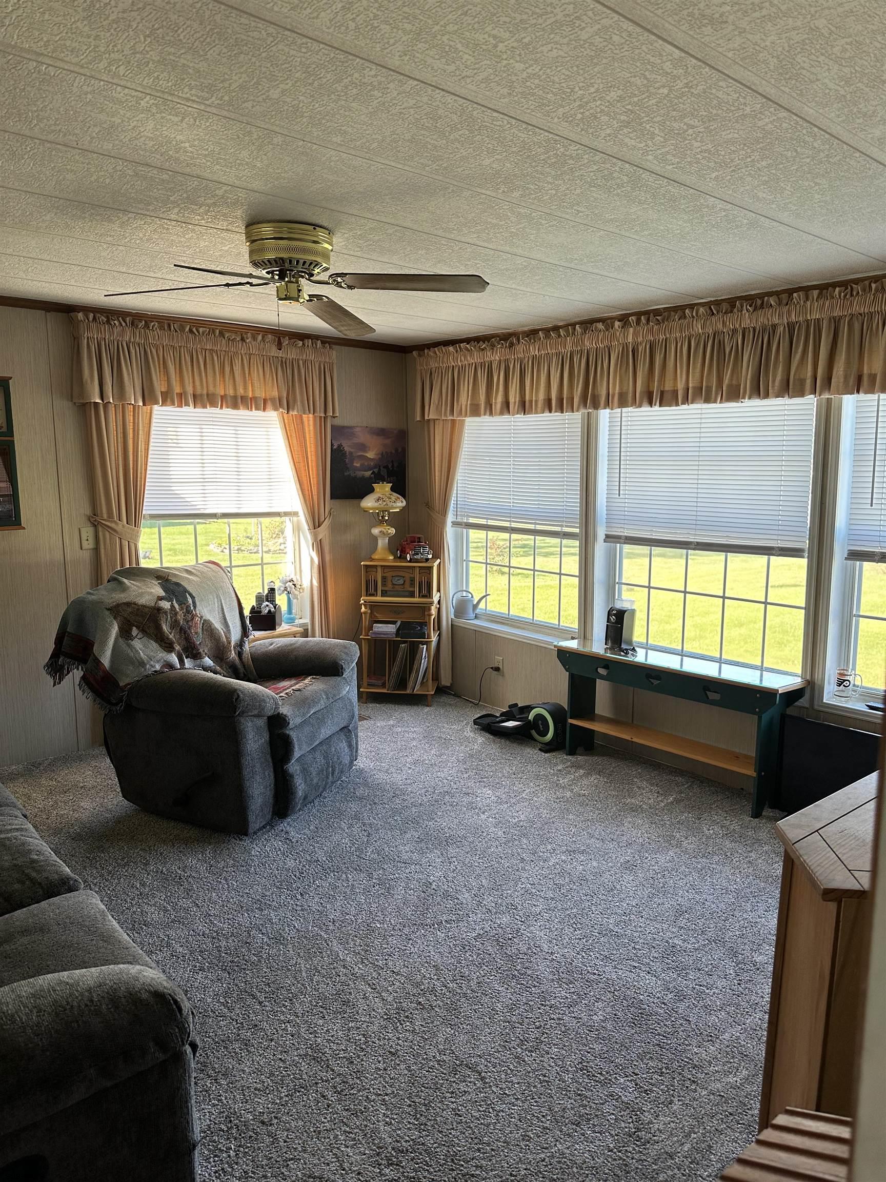 290 Mayflower Drive Buena, NJ 08310 - Photo 13 of 20 a living room with furniture and a flat screen tv