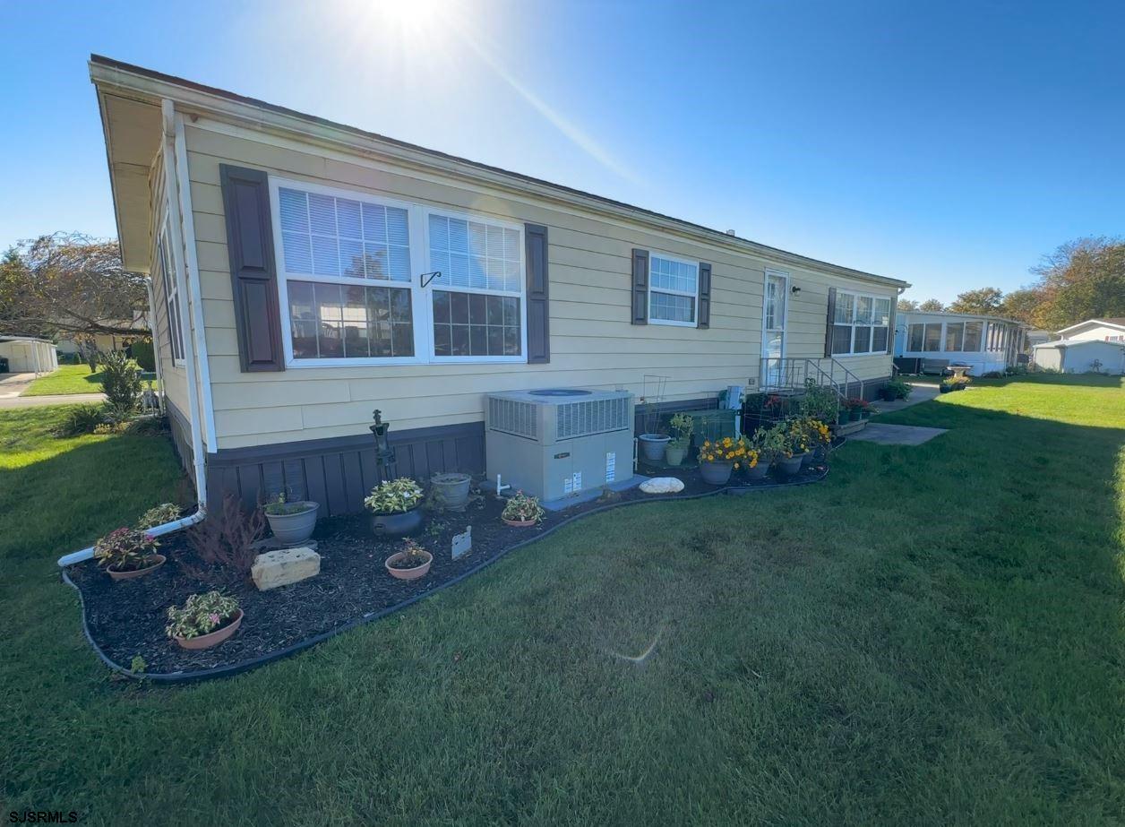 290 Mayflower Drive Buena, NJ 08310 - Photo 20 of 20 a front view of a house with garden