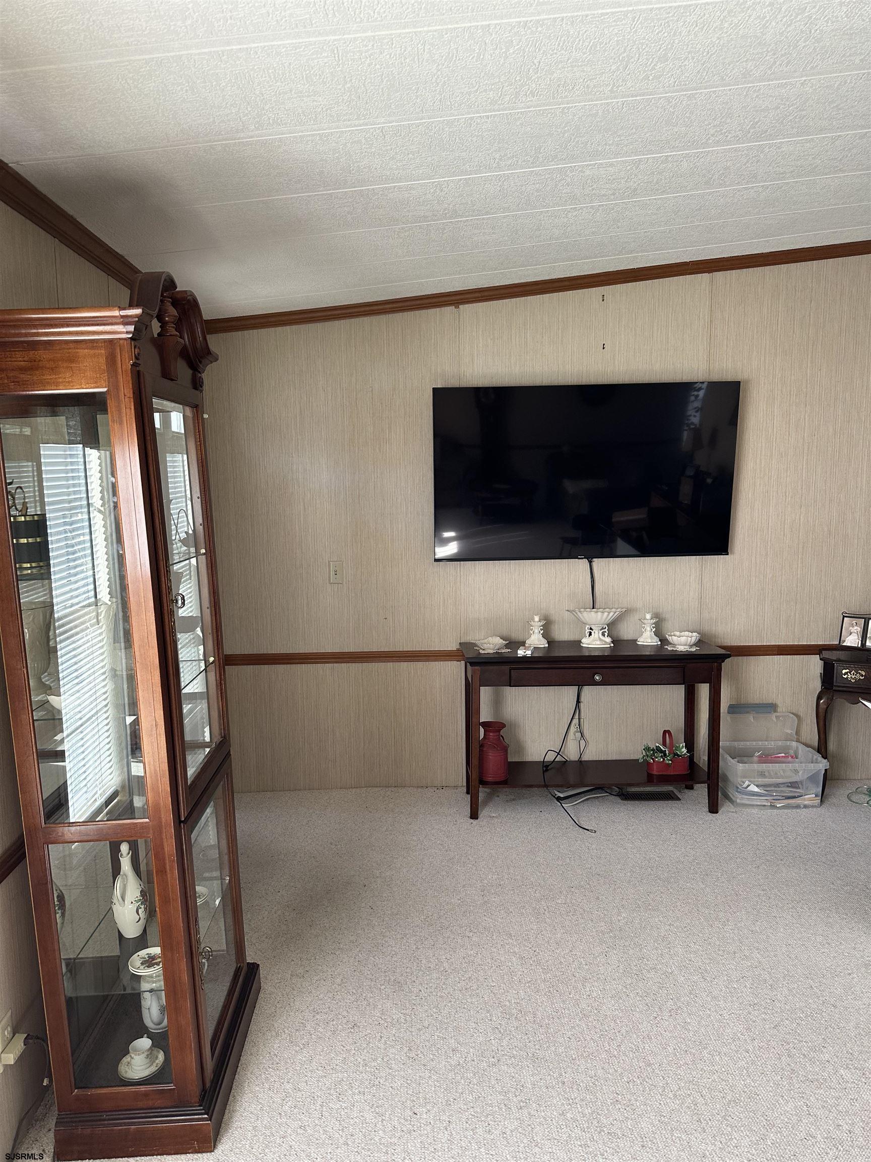 290 Mayflower Drive Buena, NJ 08310 - Photo 5 of 20 a view of living room with furniture and a flat screen tv