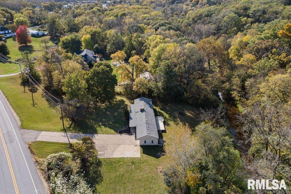 18378 Wells Ferry Road Bettendorf, IA 52722 - Photo 5 of 35 an aerial view of a house with a yard basket ball court and outdoor seating