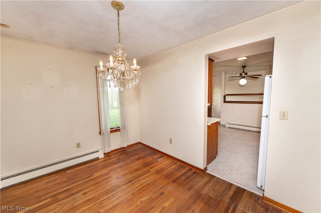 12310 Huntoon Road Painesville, OH 44077 - Photo 11 of 48 Formal dining room with classic chandelier