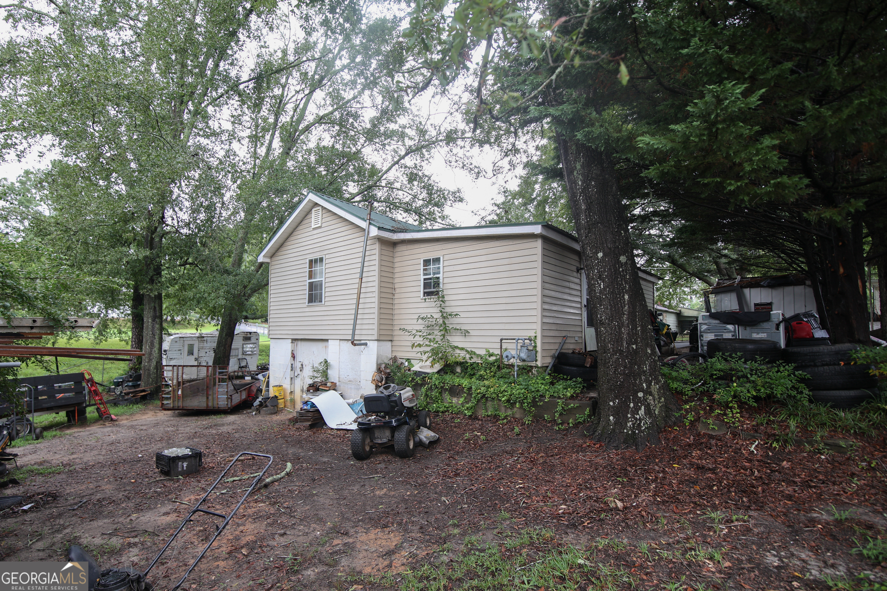 51 Busha Street Toccoa, GA 30577 - Photo 4 of 12 a view of a house with backyard