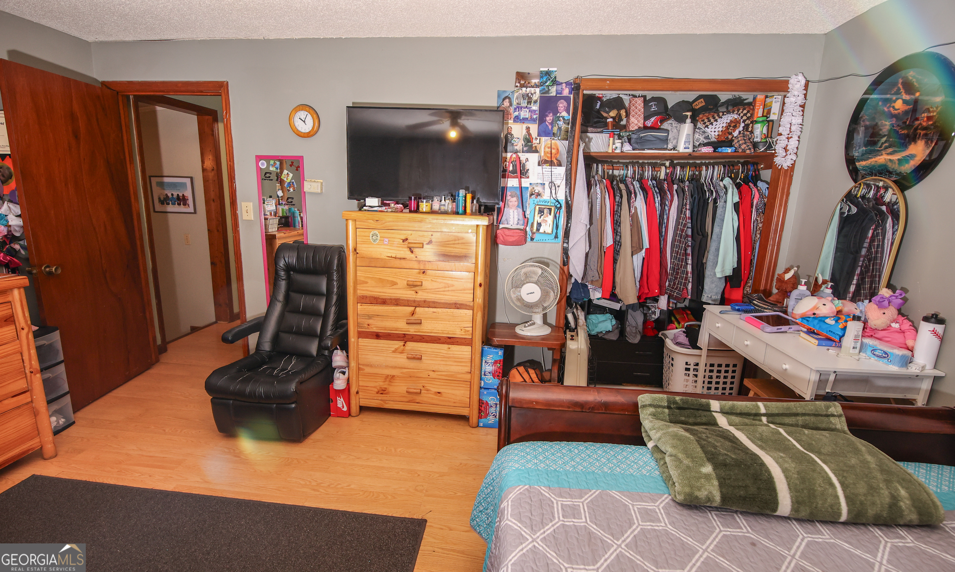 51 Busha Street Toccoa, GA 30577 - Photo 8 of 12 a view of walk in closet with clothes and shoes