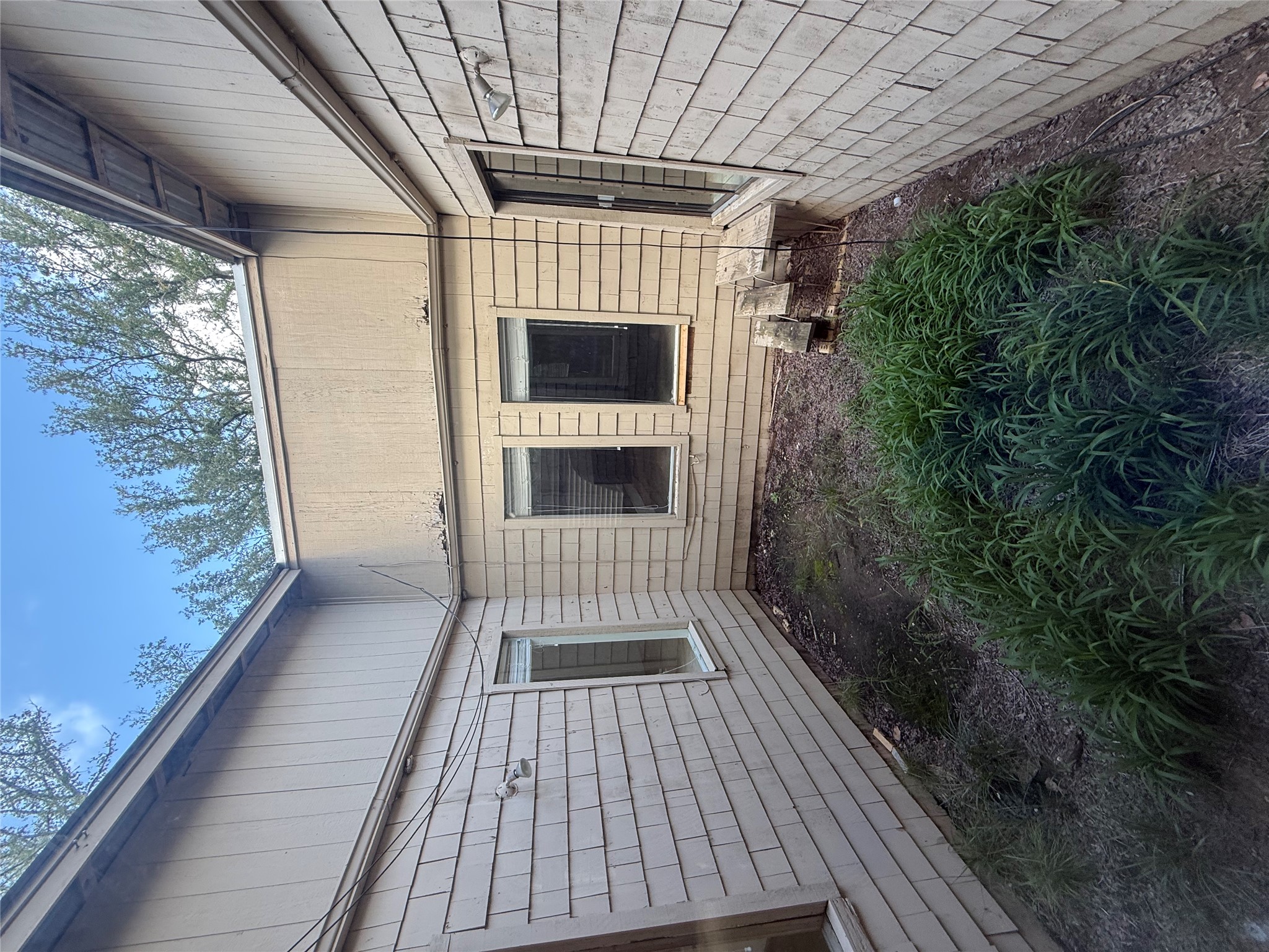 254 Lone Star Road Bastrop, TX 78602 - Photo 14 of 20 Central atrium provides natural light and a private outdoor space.
