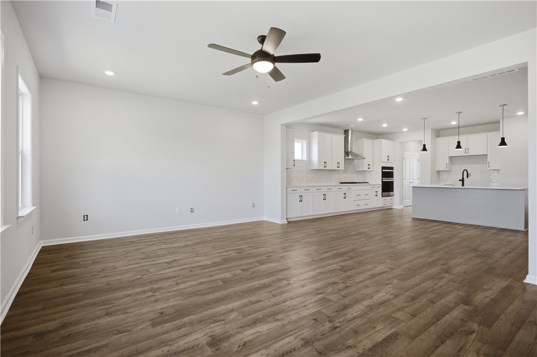 552 Hydrangea Street, Unit LOT 66 Seneca, SC 29678 - Photo 12 of 31 An open concept design seamlessly connects the spacious living area to a modern kitchen.