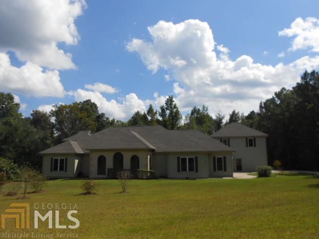 1611 Estes Road Rutledge, GA 30663 - Photo 1 of 1 a front view of a house with a yard