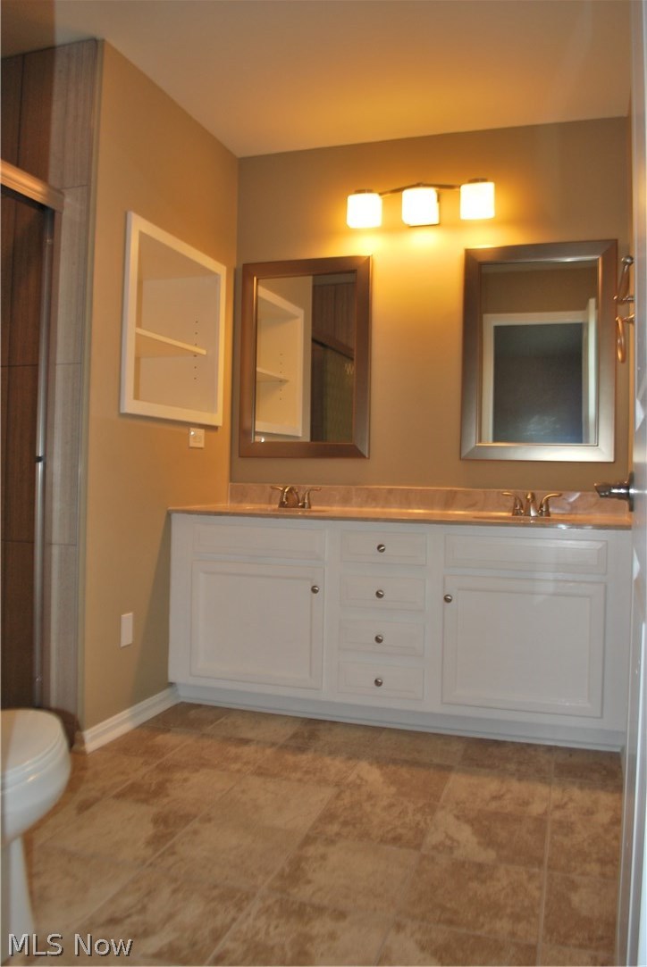 4260 Ridgewood Road Akron, OH 44321 - Photo 22 of 35 Master bath double sinks.