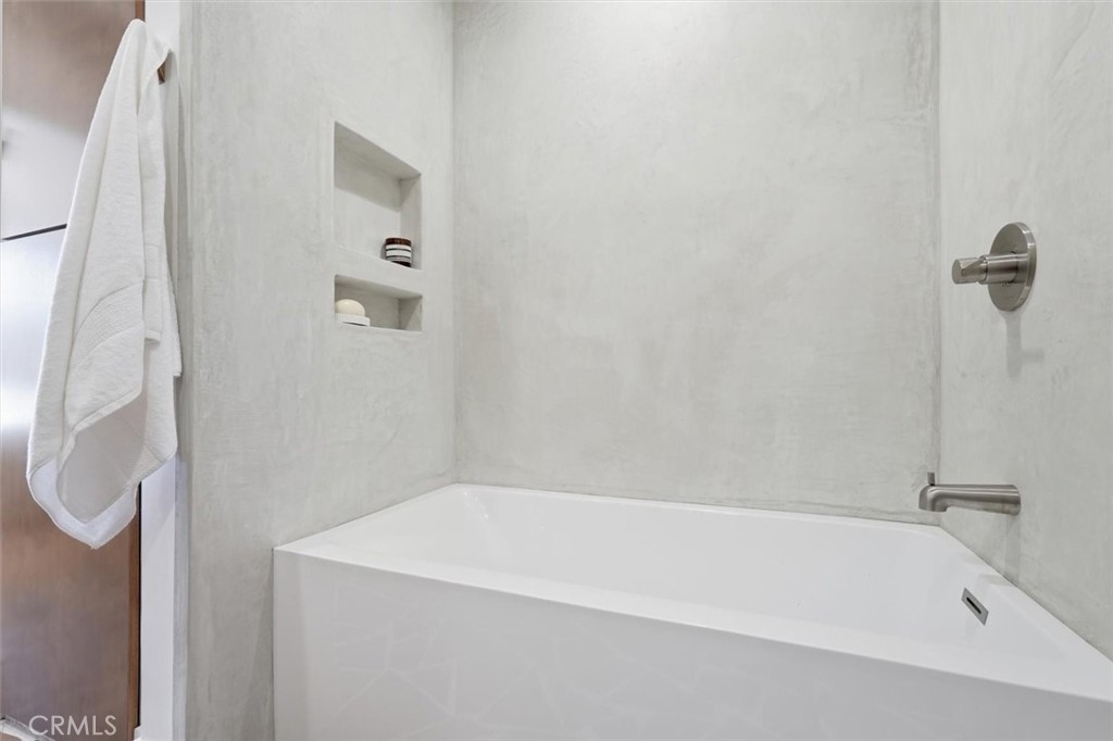 8140 Calabar Avenue Playa del Rey, CA 90293 - Photo 37 of 60 a bathroom with a white bath tub