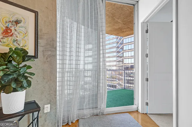 a view of a room that has a window in it