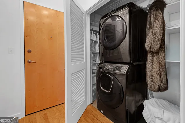 a utility room with dryer and washer