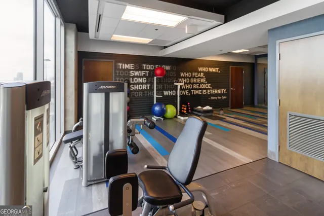 a view of a room with gym equipment