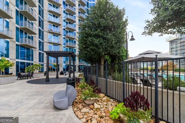 a view of a building with a garden