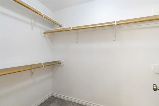 a view of a room with racks on the wall