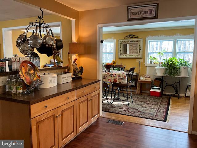 Kitchen view into extended bonus/dining space