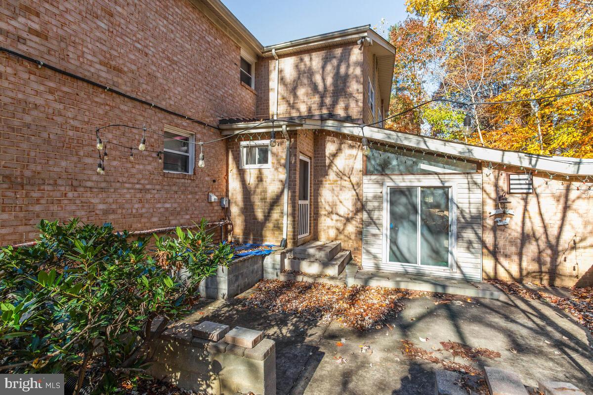 16140 Kenny Road Laurel, MD 20707 - Photo 25 of 26 Patio outside of pool house