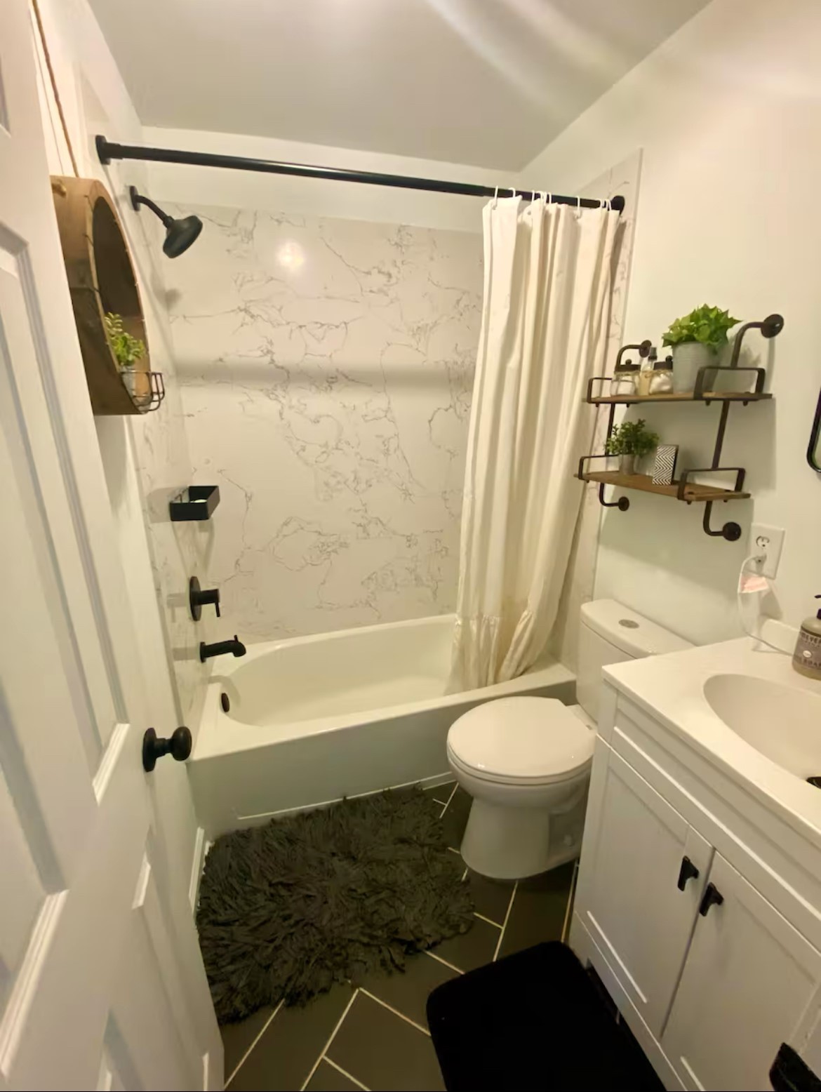 1975 Kelly Road Holladay, TN 38341 - Photo 75 of 95 a bathroom with a sink toilet and shower