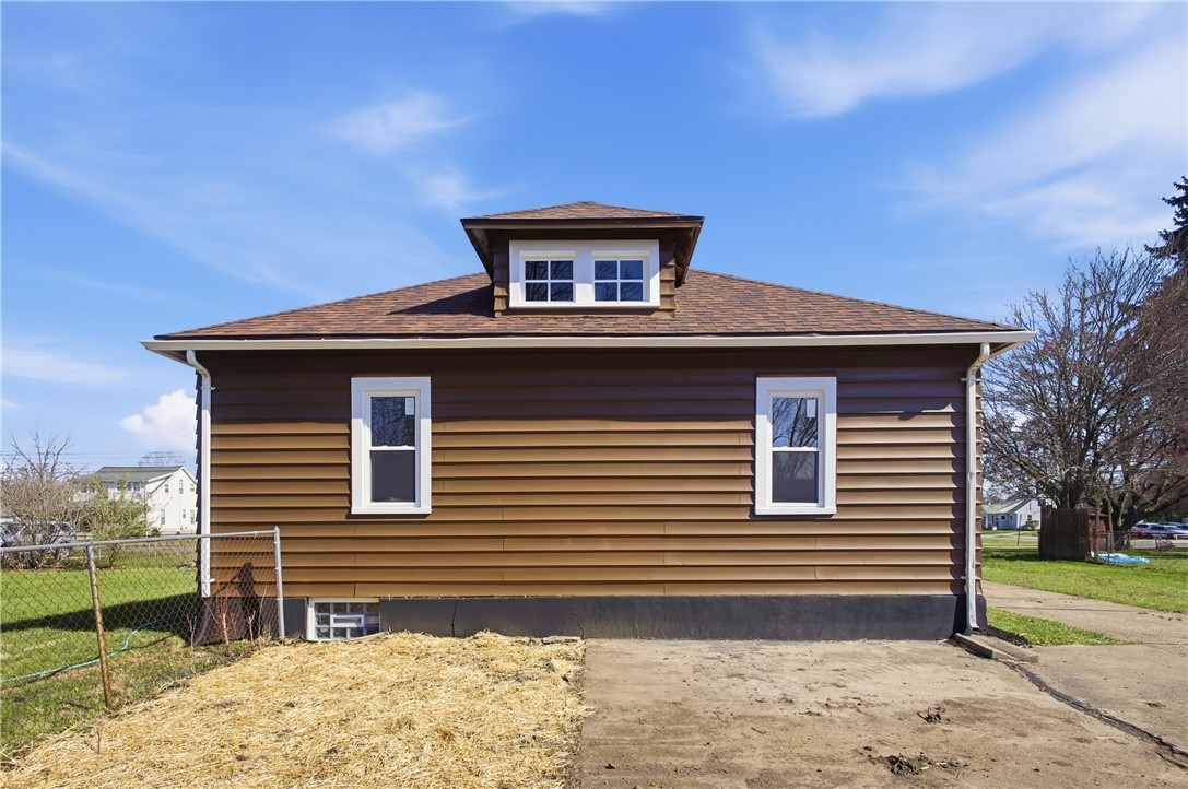 1925 Sunset Avenue Springfield, OH 45505 - Photo 36 of 45 This charming home features horizontal siding and a dormer, complemented by a sturdy shingle roof.