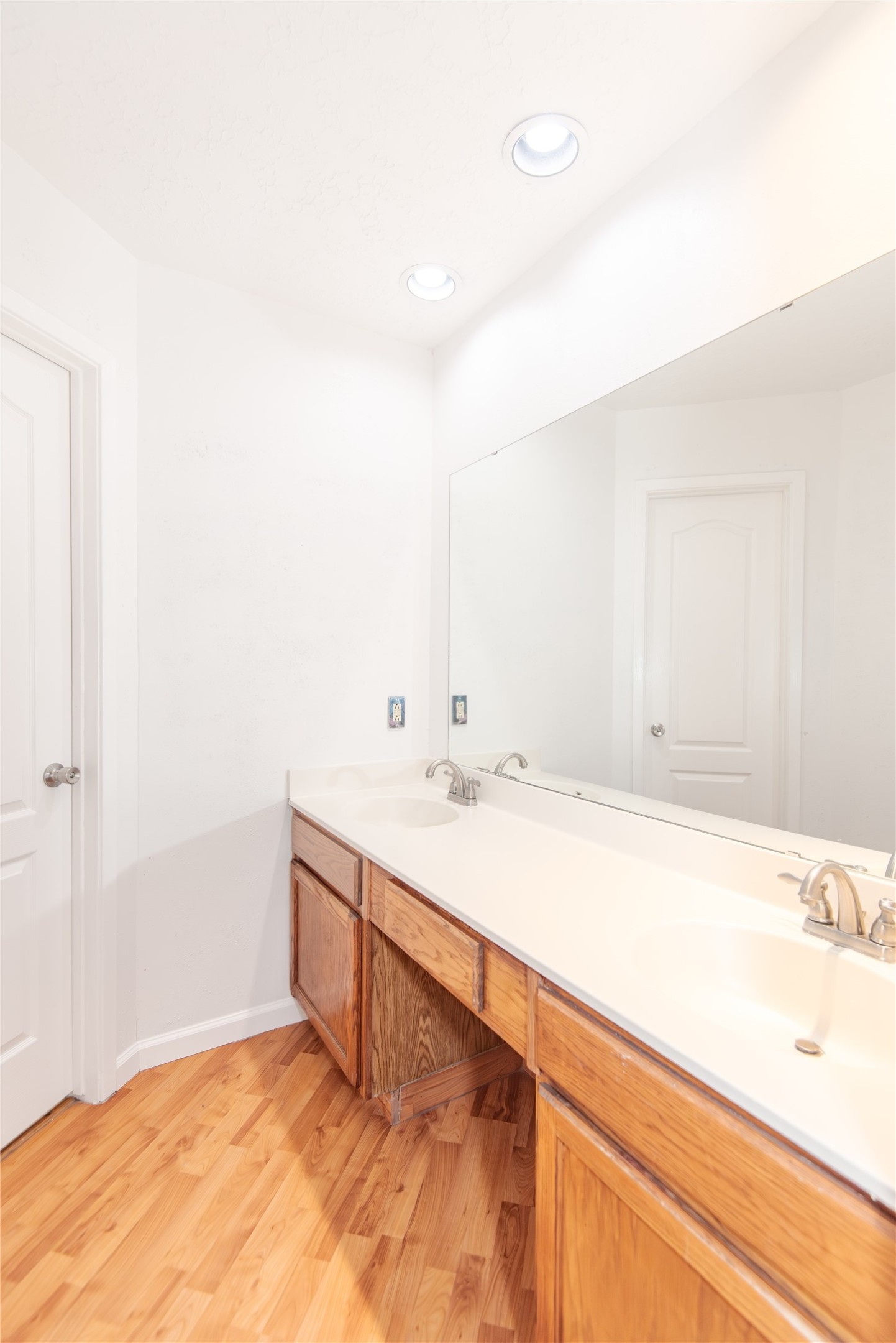21734 Nickerton Lane Spring, TX 77388 - Photo 18 of 31 a bathroom with a sink and a mirror